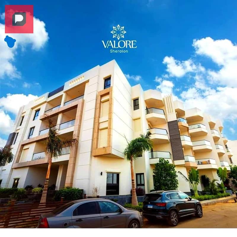 Hotel apartment for sale next to City Center Almaza, fully finished with kitchen and air conditioners in Valore Sheraton View Landscape Compound 18