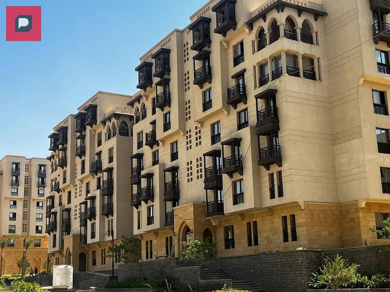 For sale, a two-bedroom apartment, immediate delivery, in Arabesque Al-Fustat Compound in Old Cairo, with installments up to 12 years from the Egyptia 14