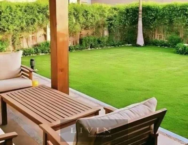 With a down payment of 450,000, a two-bedroom apartment with a garden for sale,  open view on landscape, in Sarai Compound, Mostaqbal City 2