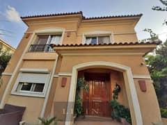 stand alone villa 5 bedrooms for sale in Fifth Settlement, new cairo ( 3 floors+ garden + roof ) lakes & green area view - 8 years installments plan