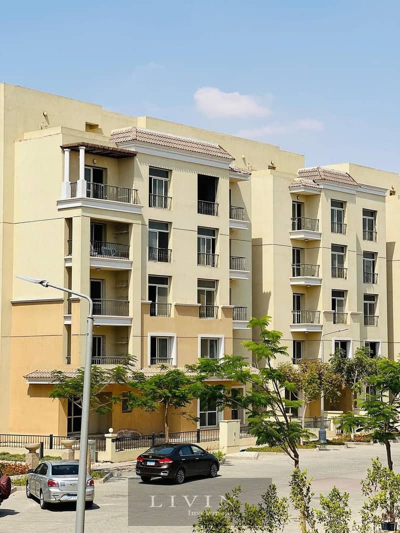 with 42% discount apartment 2 bedrooms for sale in Fifth Settlement wall by wall with madinaty , sarai new cairo compound , 8 years installments 11