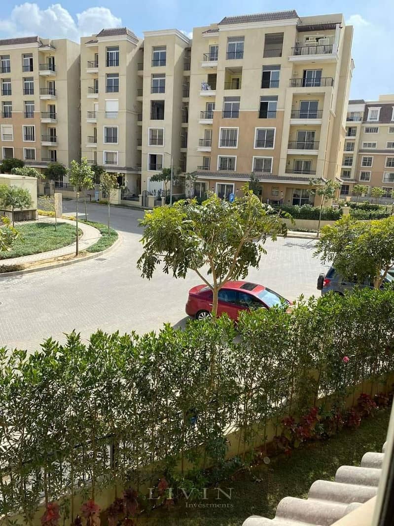 with 42% discount apartment 2 bedrooms for sale in Fifth Settlement wall by wall with madinaty , sarai new cairo compound , 8 years installments 14