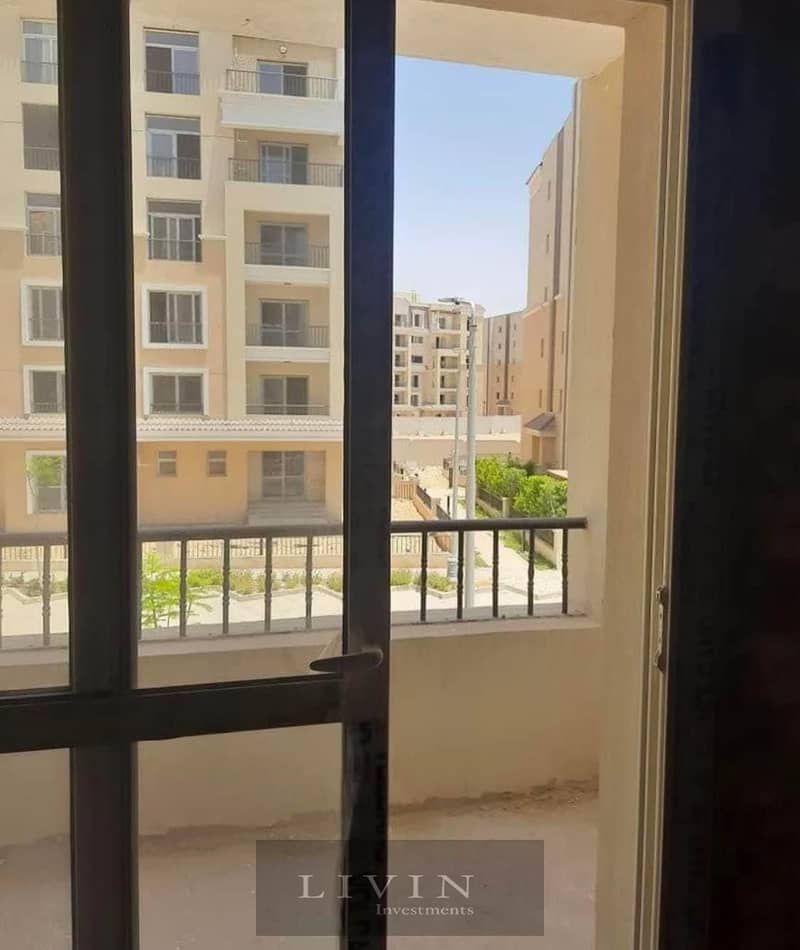 with 42% discount apartment 2 bedrooms for sale in Fifth Settlement wall by wall with madinaty , sarai new cairo compound , 8 years installments 15