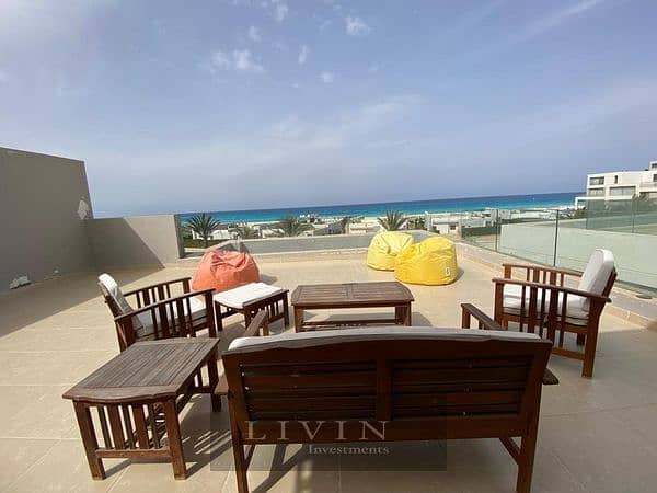 ready to deliver - chalet for sale in la vista cascada north coast , sidi abd elrahman , beside marassi , sea view &lagoons - 4 bedrooms fully finishe 0