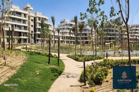 شقة بالحديقة علي البارك الرئيسية تشطيب سمارت للإيجار اول استخدام | Fully Finished Smart Apartment with Garden on the Main Park in Sky Condos 0