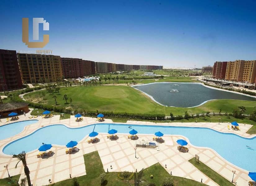 شالية للبيع جولف بورتو مارينا الساحل الشمالي  فيو لاجون وملاعب الجولف ريسيل بأقل سعر Resale Porto Golf Marina 1