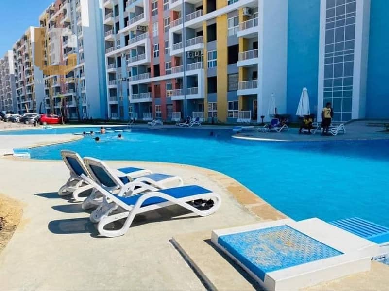 شالية للبيع جولف بورتو مارينا الساحل الشمالي  فيو لاجون وملاعب الجولف ريسيل بأقل سعر Resale Porto Golf Marina 2