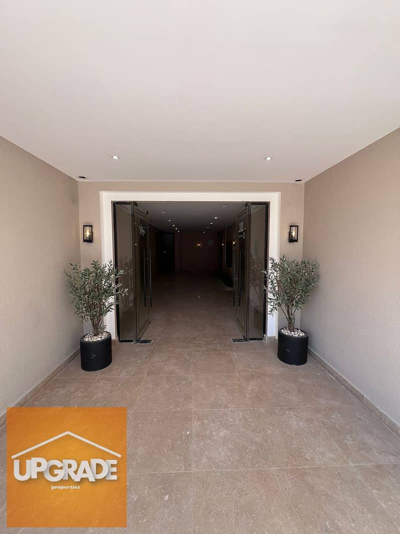 A fully finished apartment for sale with a total area of 159 sqm, ready to move in Village West compound, heart of Sheikh Zayed. With a 30% discount. 25