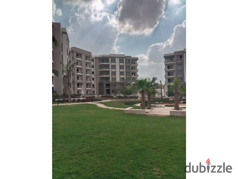 Apartment for sale in a prime location in the heart of New Cairo, at a price including maintenance, with a direct view of the largest landscape 10