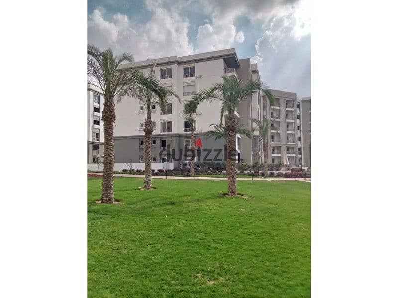 Apartment for sale in a prime location in the heart of New Cairo, at a price including maintenance, with a direct view of the largest landscape 11