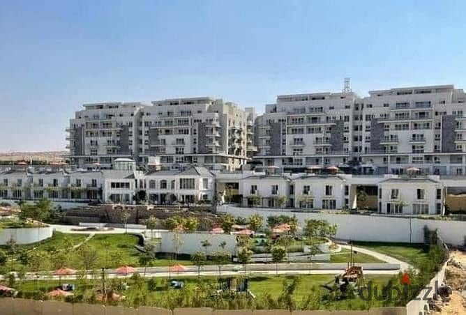 for sale apartment 3 bed direct view on lagoon under market price with installment in mountain view icity new cairo 10