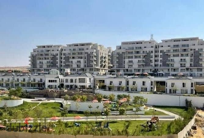 for sale apartment 3 bed direct view on lagoon under market price with installment in mountain view icity new cairo 11