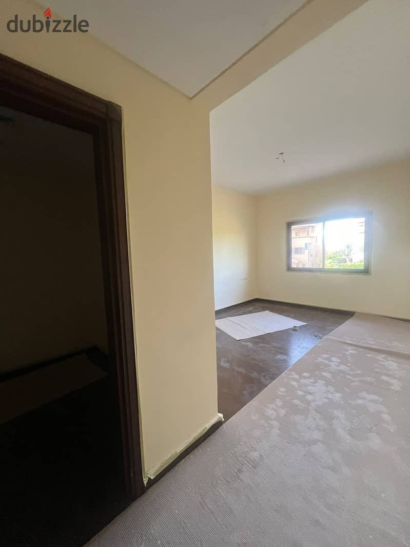 Villa for rent In mivida - Semi furnished   Kitchen -Acs in CFC 2