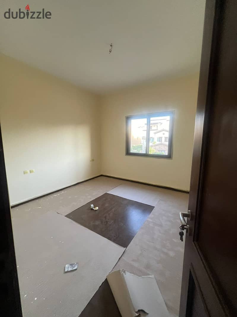 Villa for rent In mivida - Semi furnished   Kitchen -Acs in CFC 7