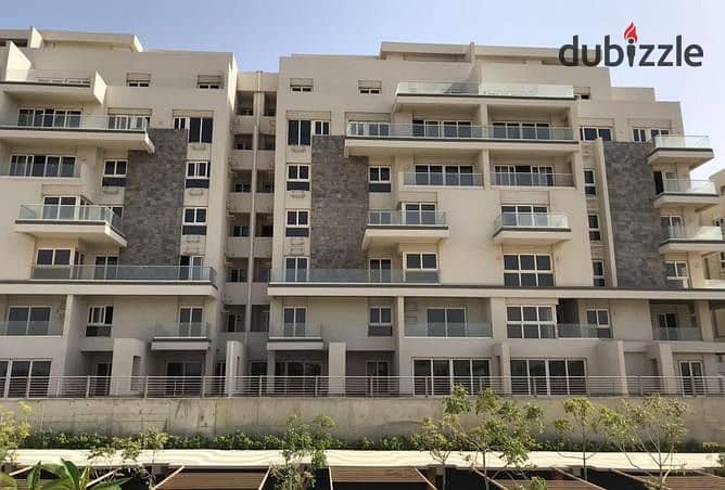 for sale apartment 3 bed direct view on lagoon under market price with installment in mountain view icity new cairo 1