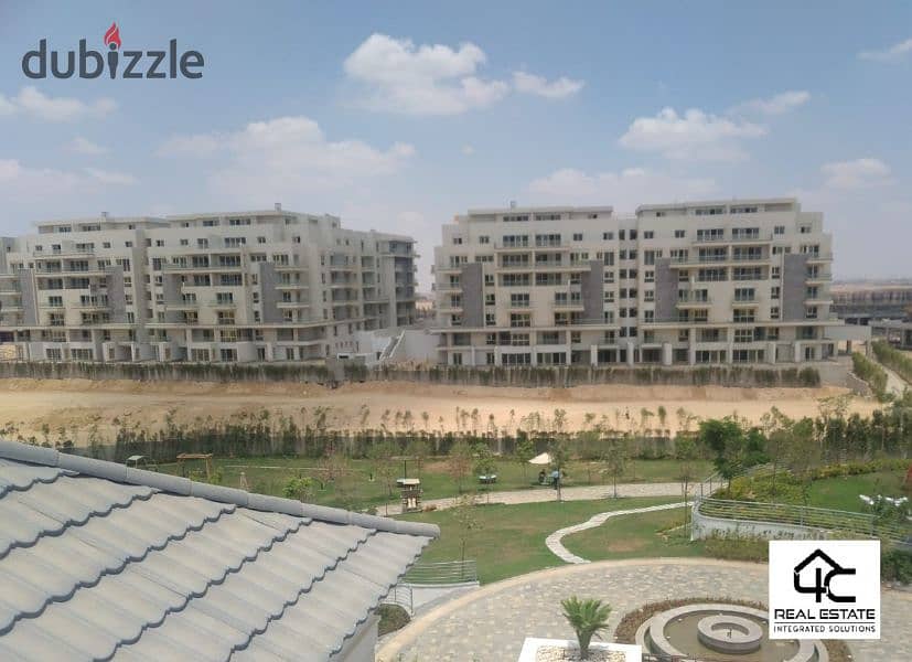 Apartment for saleIn installments , in a prime location in Mountain View iCity delivery within months 7