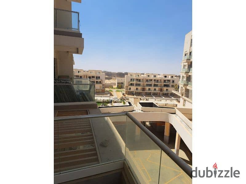 Apartment for saleIn installments , in a prime location in Mountain View iCity delivery within months 14