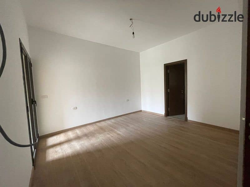 Prime location, finished nautical apartment with air conditioners for sale in Fifth Square Compound - Al Marasem 7