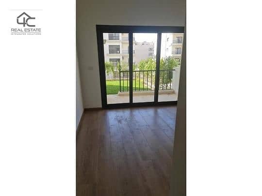 Ground floor apartment with garden, finished with air conditioners, in installments, in the Fifth Settlement 5