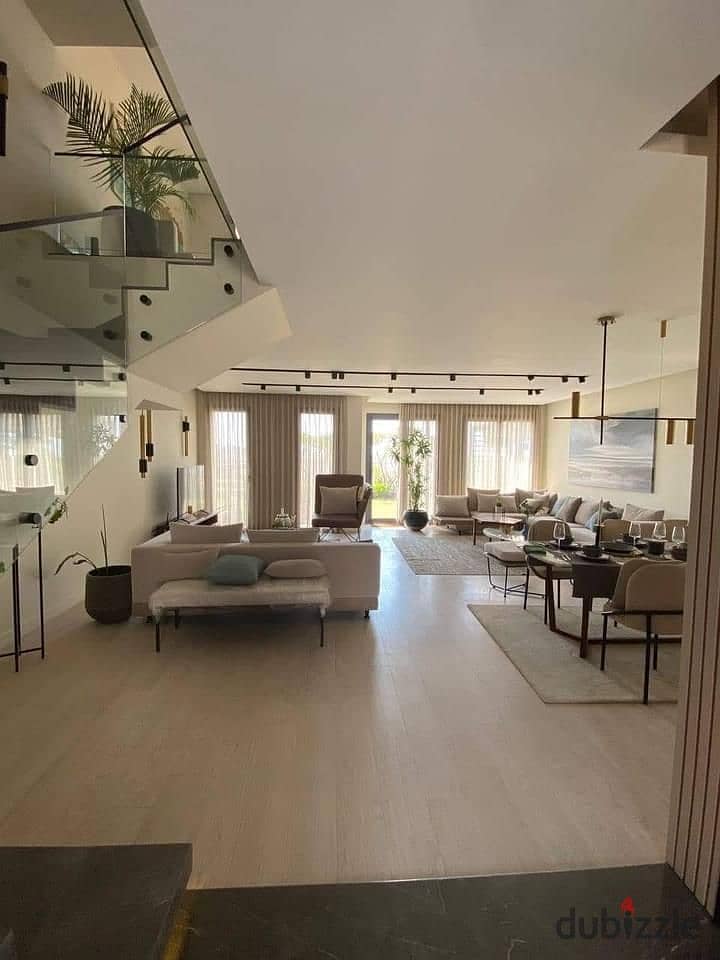 Immediately receive a fully finished, super luxury garden duplex for sale in a full-service compound in front of the International Medical Center, Al 1