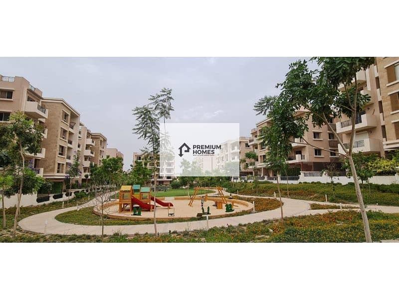 3 bedroom apartment for sale with private garden, open view, immediate delivery in Taj City Compound, with down payment and installments 2