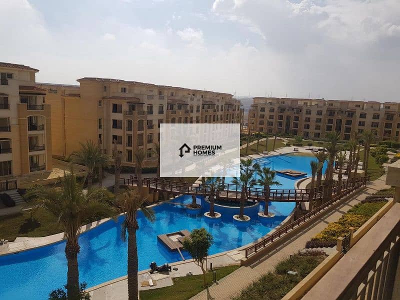 Apartment for sale, two rooms with a garden, immediate delivery, clear sea view, in Stone Residence Compound, Fifth Settlement 10