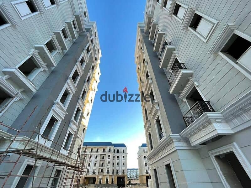 In the heart of Al-Alamin, the Latin District, your two-bedroom apartment is fully finished, with a 5% down payment, Latin District 22