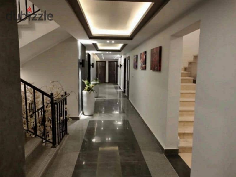 Apartment for sale in garden, 57 meters  Immediate delivery in the heart of October in Sun Capital Compound With only 10% down payment Special 40% cas 9