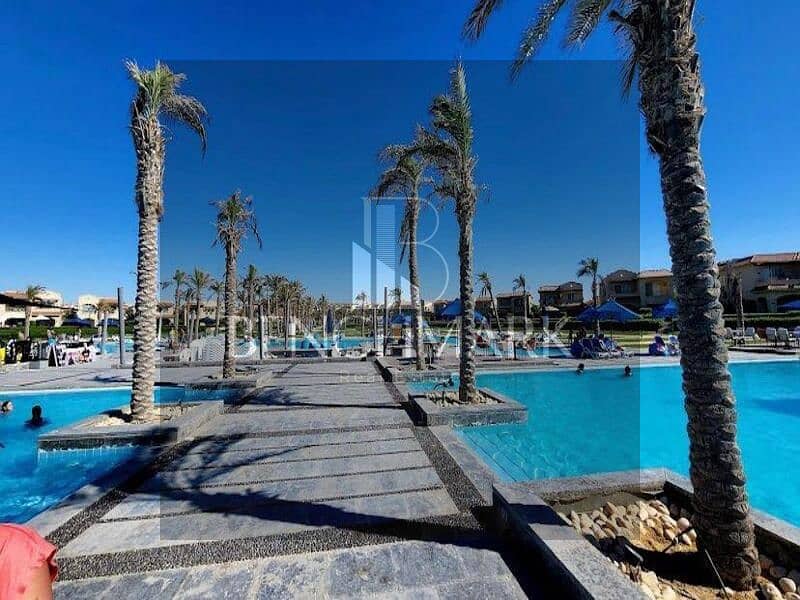 Chalet for sale, 150 meters, double view, La Vista Bay Village, North Coast, finished, installments over 7 years, next to Sol Emaar and Mountain View 11