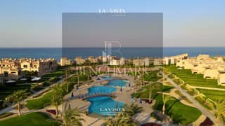 Chalet for sale, immediate delivery, ground floor with a garden, 150 meters, in La Vista Gardens Village, Ain Sokhna, next to Porto Swimming pool view