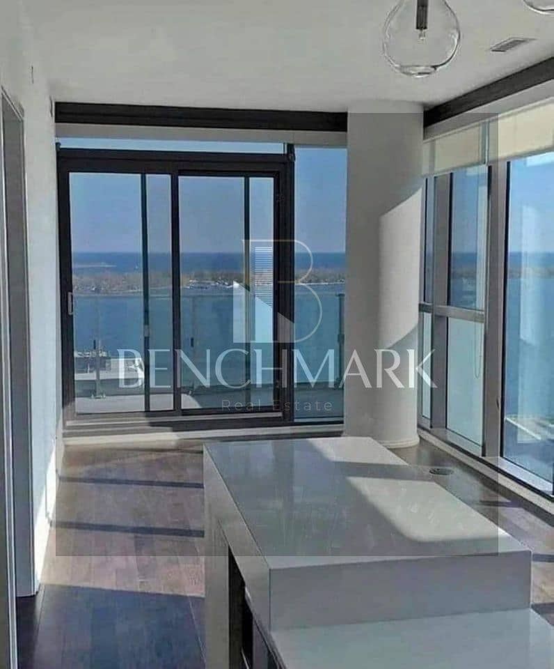 Apartment for sale in Garden 3 rooms Mazarine Compound North Coast, delivery soon, double view on El Alamein Towers next to Marina, in installments 7