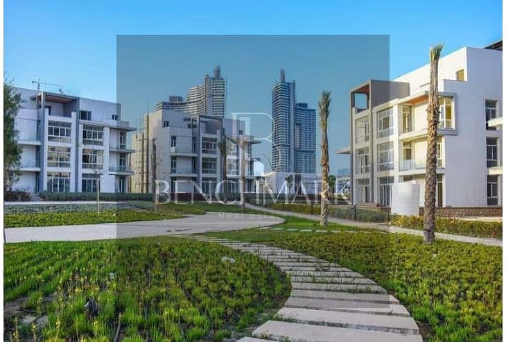 Apartment for sale in Garden 3 rooms Mazarine Compound North Coast, delivery soon, double view on El Alamein Towers next to Marina, in installments 16