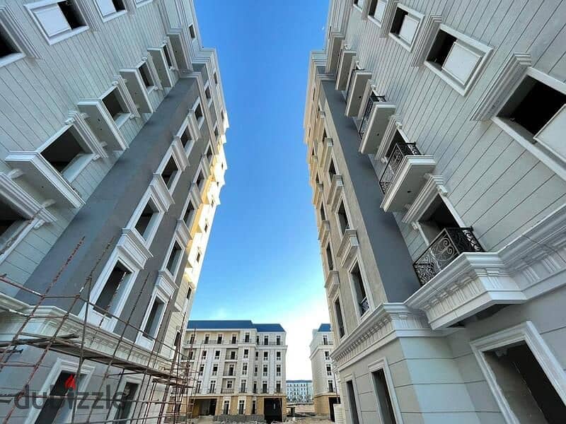 In the heart of Al-Alamin, the Latin District, your apartment is 158 square meters, fully finished, with a 5% down payment  Latin District 22