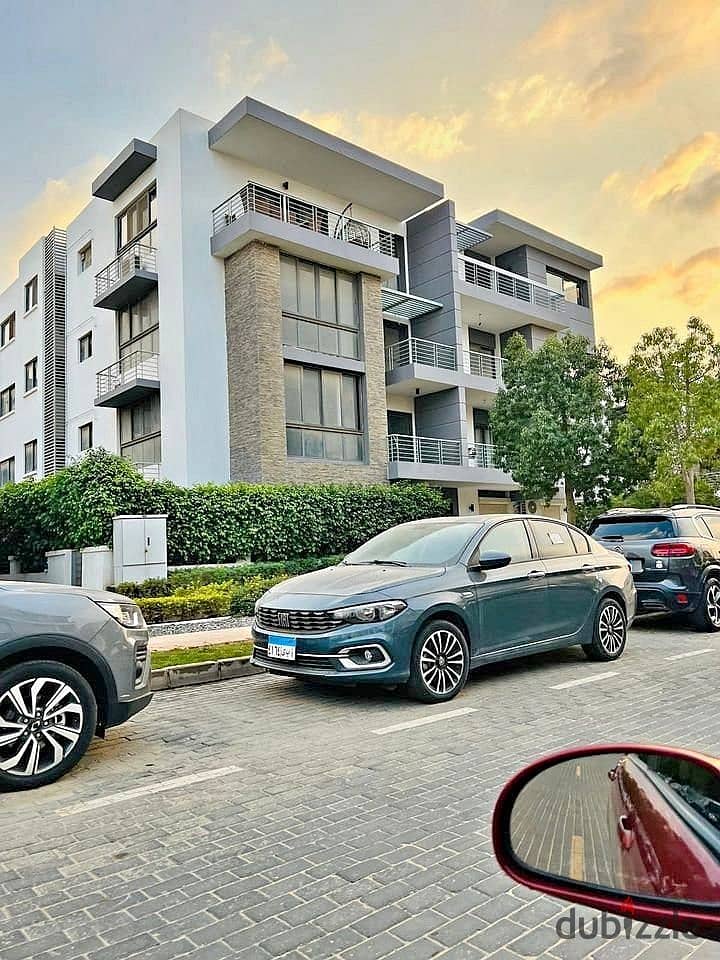 In front of the airport, with a garden and roof, a separate villa in Taj City from Nasr City for Development and Housing 1