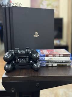 PlayStation 4 Pro 1tb + games + dock charger