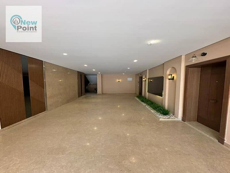 For sale, 159 sqm apartment, finished, with air conditioners + one year receipt, in Village West, in the heart of Sheikh Zayed 8