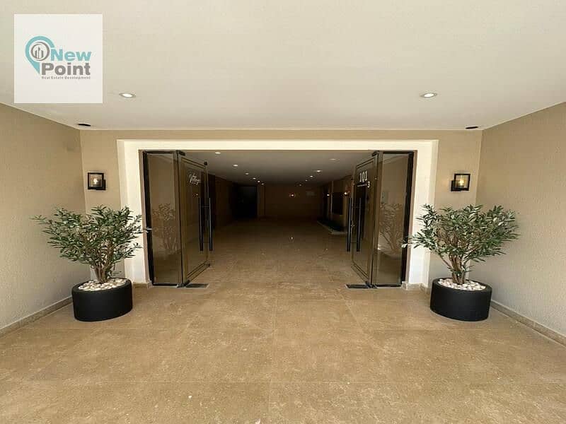 For sale, 159 sqm apartment, finished, with air conditioners + one year receipt, in Village West, in the heart of Sheikh Zayed 9