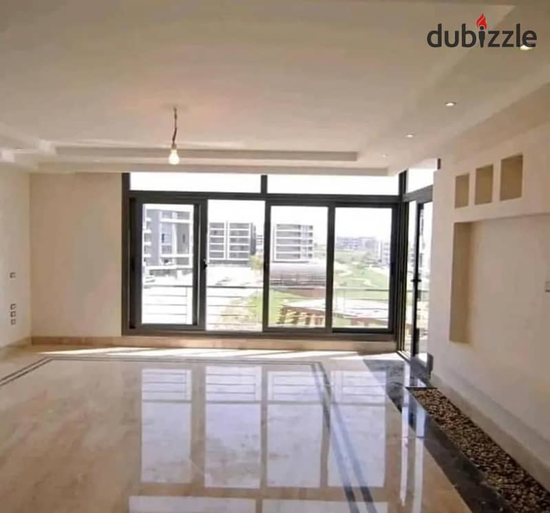 للبيع ارخص شقة 3 غرف   بسعر لقطة قسط ع 8 سنين في التجمع الاول apartment open view hot price in installments over 8 years in new cairo 2