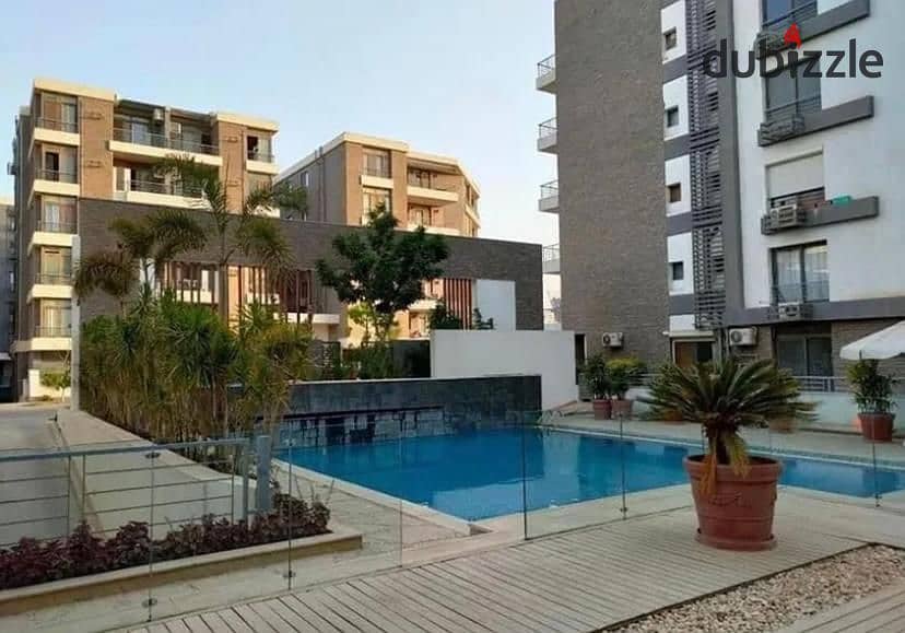 للبيع ارخص شقة 3 غرف   بسعر لقطة قسط ع 8 سنين في التجمع الاول apartment open view hot price in installments over 8 years in new cairo 9