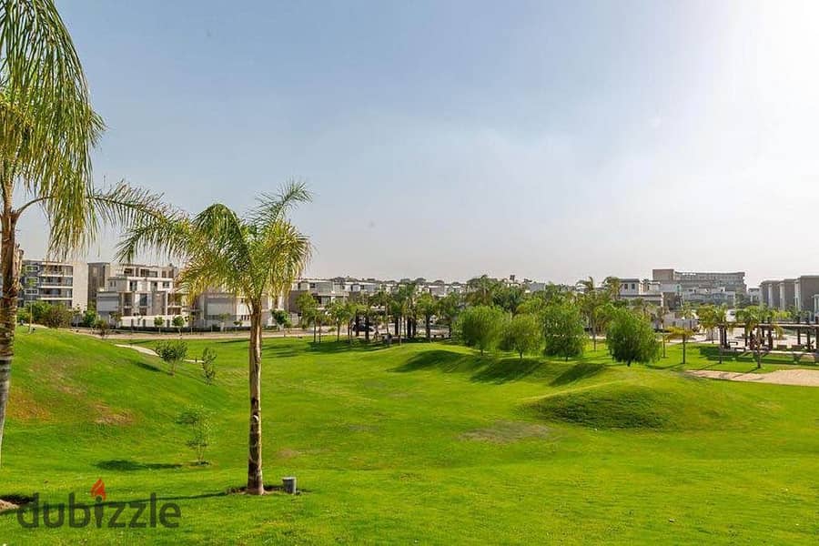 With a down payment of only 486K - a very special studio with a garden for sale in Taj City. 4