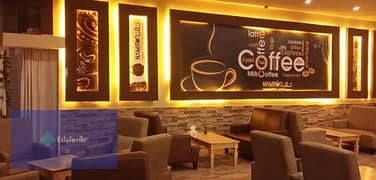 Ground floor cafe for sale in a mall directly on the Dahshour link, in installments over 5 years, next to Cairo University 0