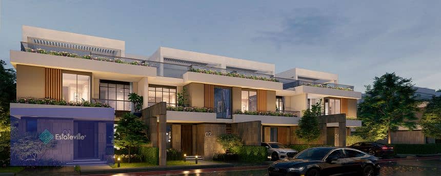 Townhouse with installments over 9 years in front of Madinaty and the Ring Road, Lagoon view 0