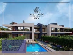 Twin house with a down payment of 2 million 700 thousand at a 5% discount in front of Al-Futtaim Mall and installments over 7 years