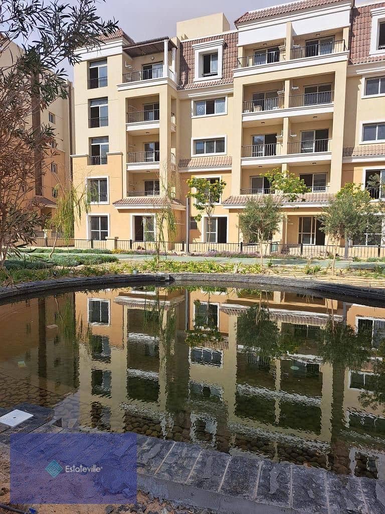 Two-bedroom apartment in the largest compound in Mostakbal 1,300 acres next to Madinaty and on the Suez Road, already living with a 5% down payment an 7