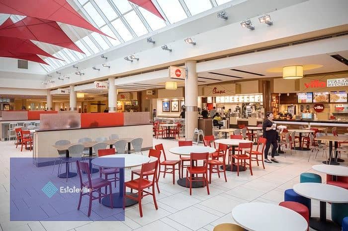 A restaurant in the food court in Out Area on the eastern axis, next to the monorail station, the Masr Mosque and the gold market, with the lowest dow 0