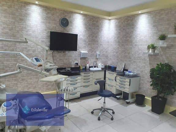 A dental clinic built with immediate receipt in a prime location, the first number in Al Amal Square and Axis, at a discount, Pam's Location in the ca 4