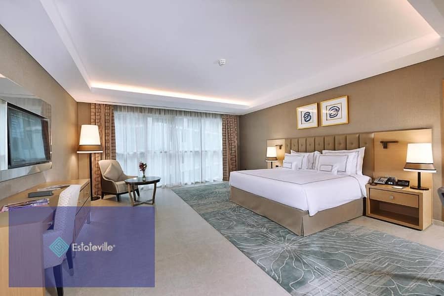 A fully furnished hotel room, in partnership with the Concorde El Salam Hotel, with a 10% down payment and payment facilities, with an annual profit o 4