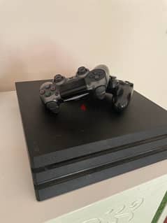 PlayStation 4 pro 1tb used with 2 controllers