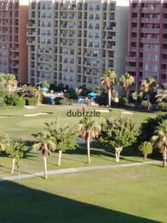 شاليه للبيع 170 م على حمام سباحة وجولف اول سكن في جولف بورتو مارينا golf porto marina الساحل الشمالي