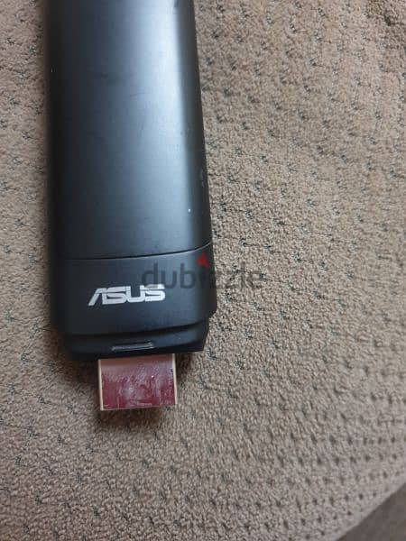 جهاز ماركه ASUS محول التليفزيون الى سمارت 1